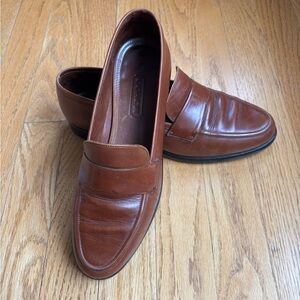 Coach brown leather loafers.